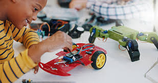 Child working on robotics project
